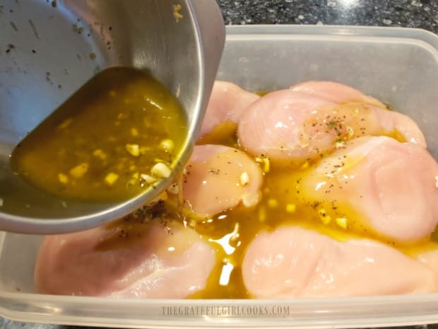 Chicken breasts are coated with the marinade, then refrigerated.