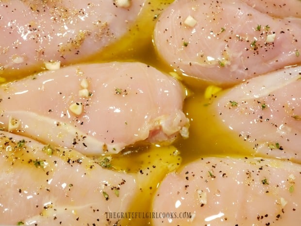 Marinated chicken breasts are refrigerated for 3-4 hours before grilling.