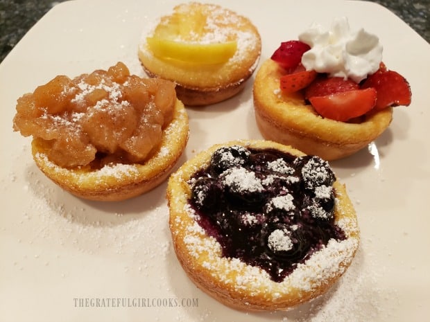 Top each one with sifted powdered sugar, whipped cream or maple syrup.