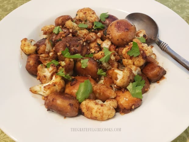 A bowl of the cauliflower mushroom skillet side dish, ready to eat.