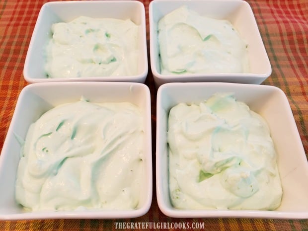 The mousse is transferred to 4 small dessert dishes, and then refrigerated.