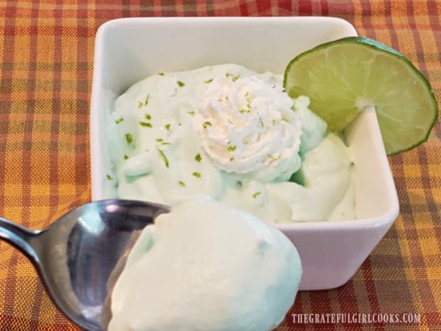 A spoonful of the creamy lime mousse is ready to eat!