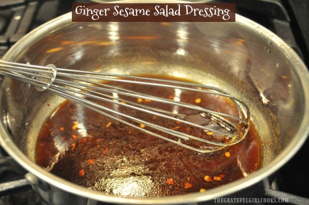 Ginger Sesame Salad Dressing is easy to make in a few minutes! Drizzle this tasty Asian-inspired dressing on a favorite mixed green or entree salad.