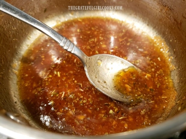 the basting glaze has reduced in volume and is syrupy, for brushing on chicken.