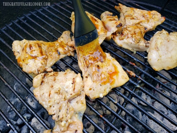 Marinated chicken thighs are grilled, and basted with honey lime glaze as they cook..