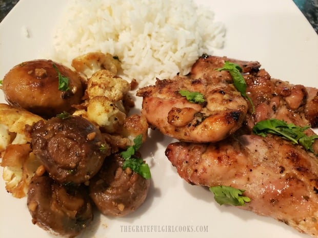 Rice and a veggie dish are served along with the honey lime grilled chicken.