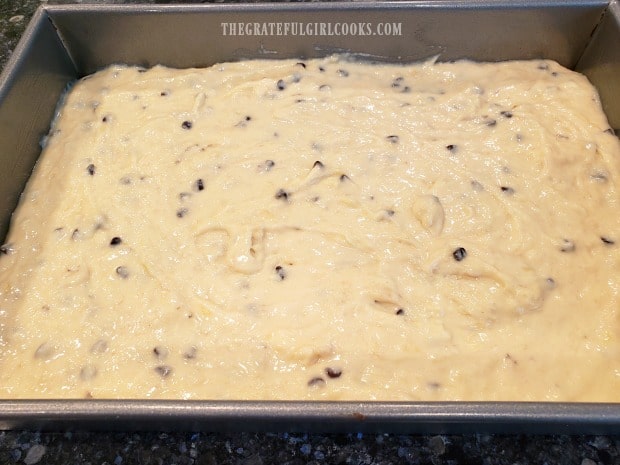 Batter is spread evenly in a 13"x 9" baking pan before baking.