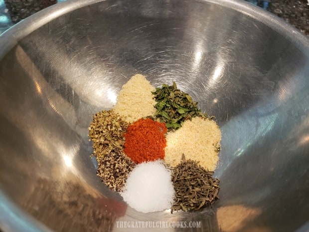 Spices for the black beans and rice are combined in a small bowl.