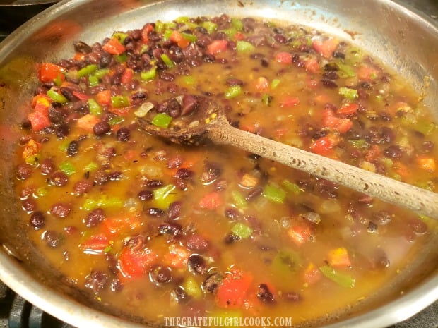 The ingredients are cooked for 10 minutes before adding rice.