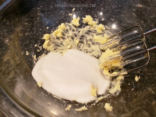 Butter is beaten until creamy, then sugar is added.