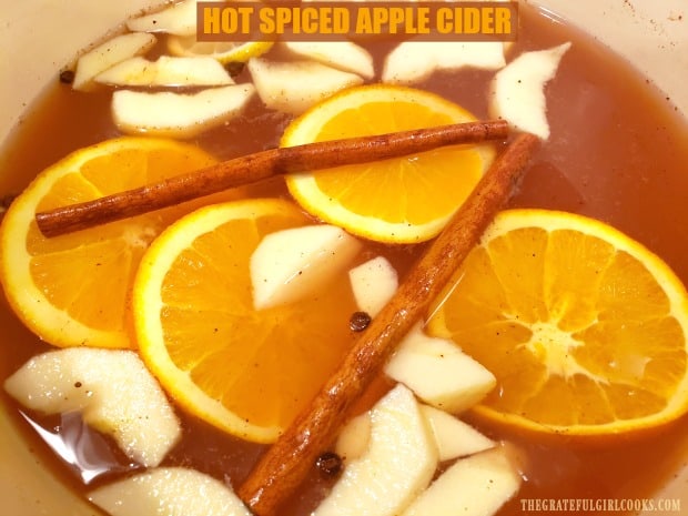 Warm up with a mug of "easy-to-make" hot spiced apple cider! It's a delicious "family-friendly" drink to serve at any gathering or holiday!