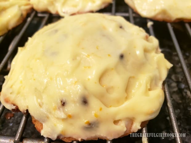 Each of the orange chocolate chip cookies are topped with the citrus frosting.