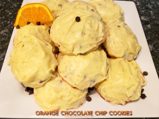 Orange Chocolate Chip Cookies, topped with a creamy orange frosting, are a soft, delicious, and wonderfully decadent treat you will enjoy!