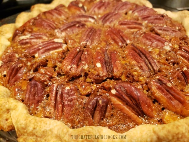 The top of the awesome pecan pie is golden browned after baking.