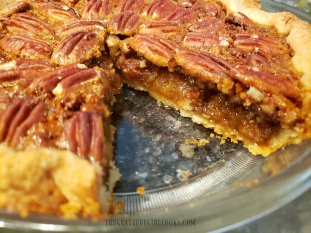 Taking a peek at the inside of the finished pecan pie.