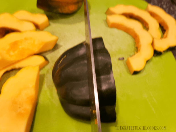 Each of the pieces of squash are sliced into crescent-shaped slices.