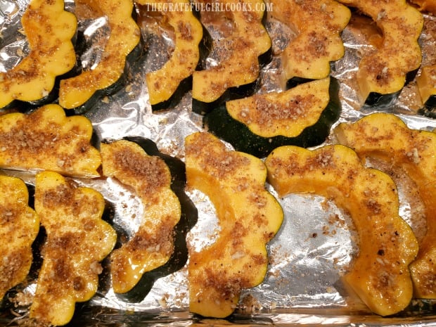 Pecan/brown sugar mixture is sprinkled onto squash slices before baking.