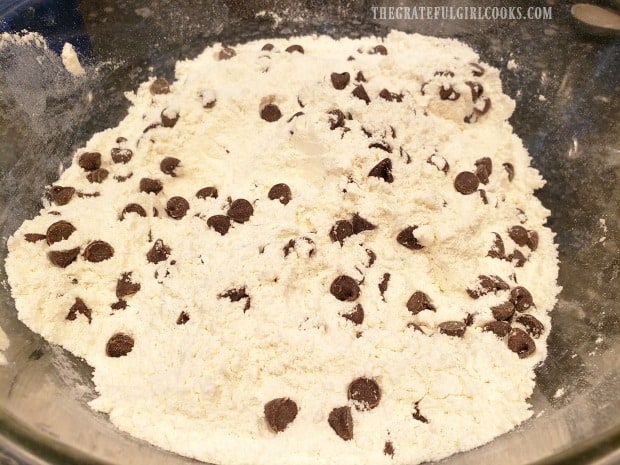 Dry ingredients are sifted, together then chocolate chips are added.