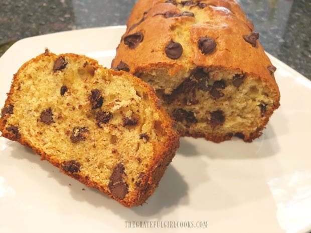 A slice of the chocolate chip banana bread, sliced and ready to eat.