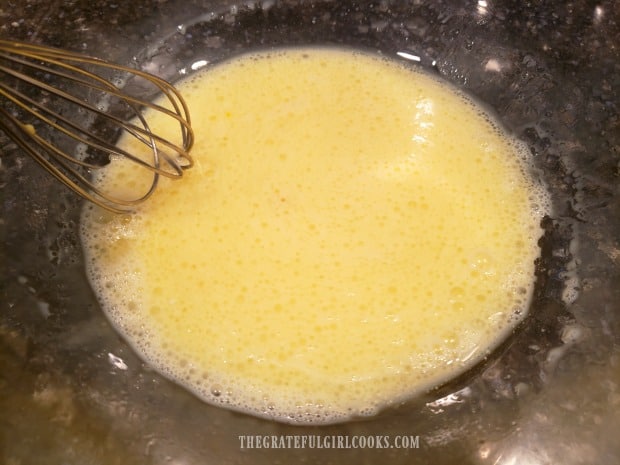 Wet ingredients are whisked together before adding to dry ingredients.