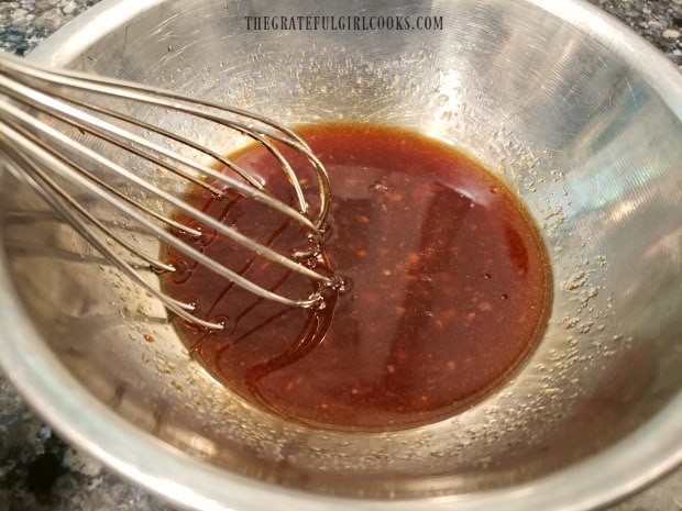 An Asian-inspired sauce is whisked together to pour over salmon before baking.