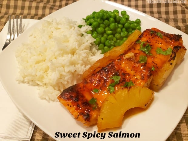 Sweet Spicy Salmon is an easy-to-make, delicious seafood dish! Seasoned fillets are covered with a pineapple/Asian-inspired sauce and baked.