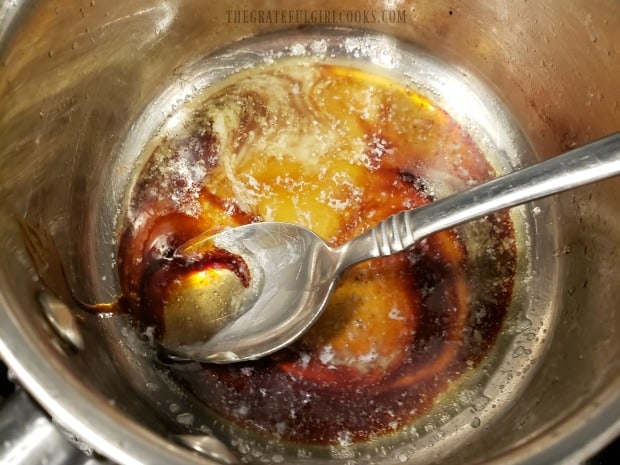 Cooking the ingredients for the buffalo honey sauce.