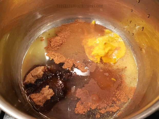 Brown sugar, OJ, honey & spices are combined in saucepan to cook the glaze.
