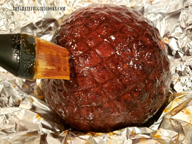 After baking, another coating of glaze is applied to the ham, then cooked longer.