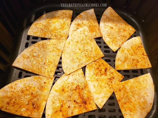 Cooking Chili-Lime Tortilla Chips in air fryer one batch at a time.