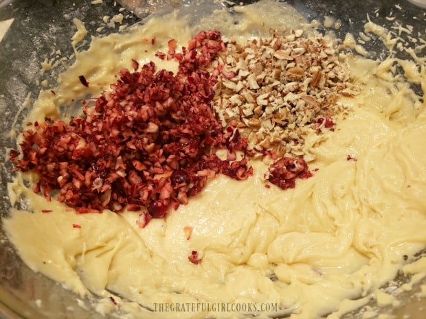 Finely chopped cranberries and pecans are added to the bread batter.