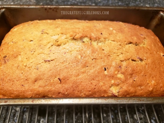 When done, the cranberry orange bread is golden brown on top.