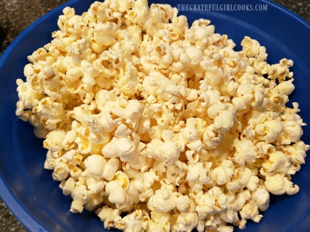 Plain popcorn is popped and ready to turn into caramel corn.