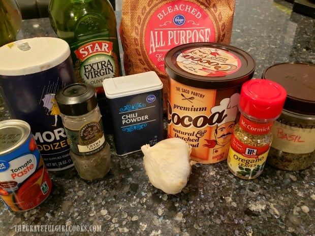 A collection of the ingredients used to make this enchilada sauce.