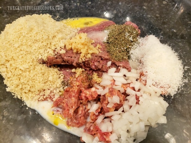 The ingredients for the meatloaf are combined in a large bowl.