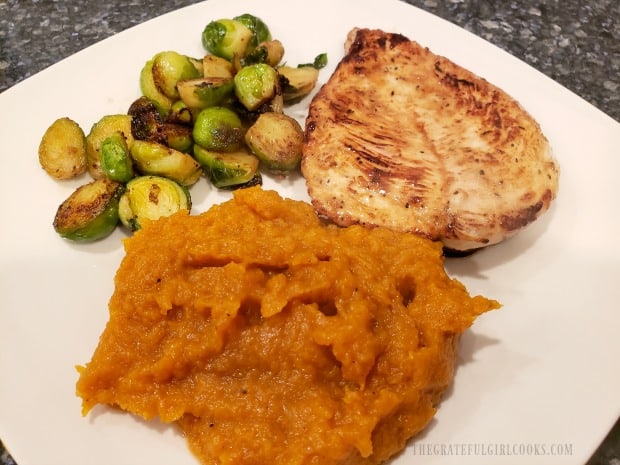 The creamy mashed butternut squash, served with chicken and brussel sprouts.