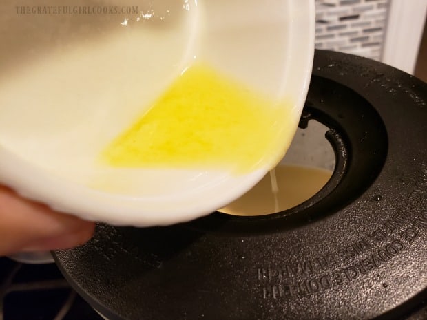 Melted and cooled butter is added to the batter for the Dutch baby.