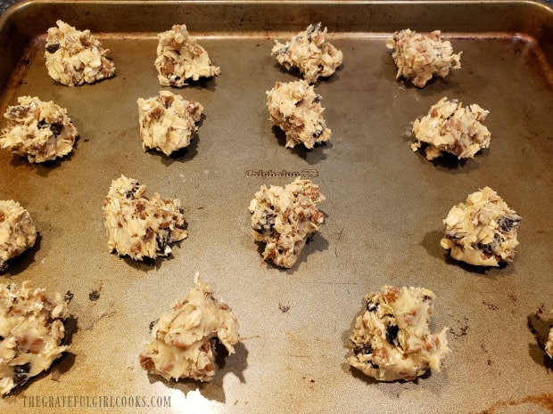 Batter for the oatmeal cinnamon chip cookies on baking sheet ready for oven.