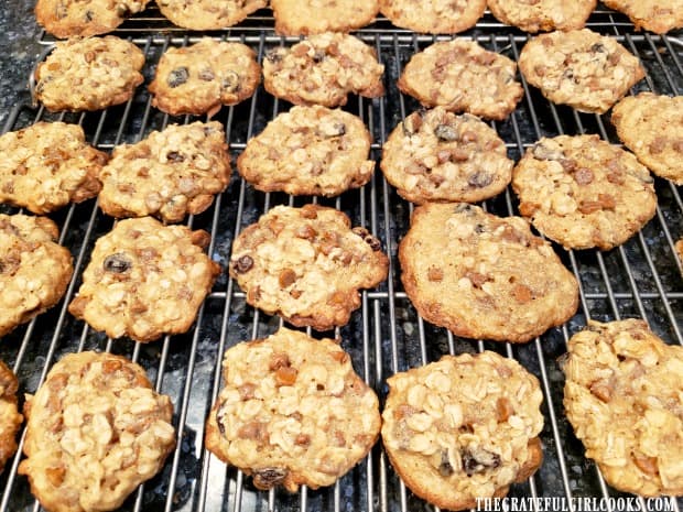 After baking, the oatmeal cinnamon chip cookies cool on wire racks.