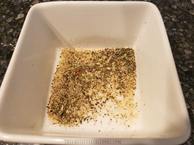 An Italian-inspired seasoning mix is combined in a small dish.