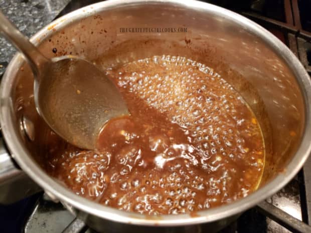 The reserved marinade is brought to a boil and cooked, to thicken sauce.