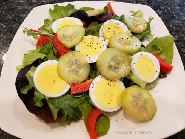 Marinated cucumbers are delicious and crunchy added to a mixed green salad.