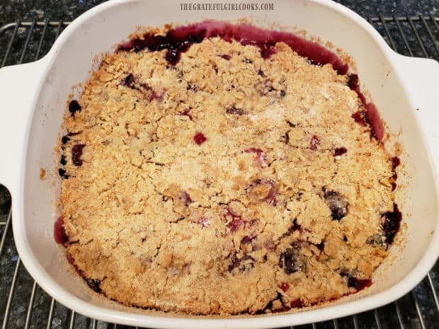 After baking, the blueberry cranberry crisp is golden brown on top.