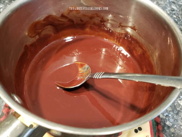 Butter and chocolate are melted until smooth then removed from heat.
