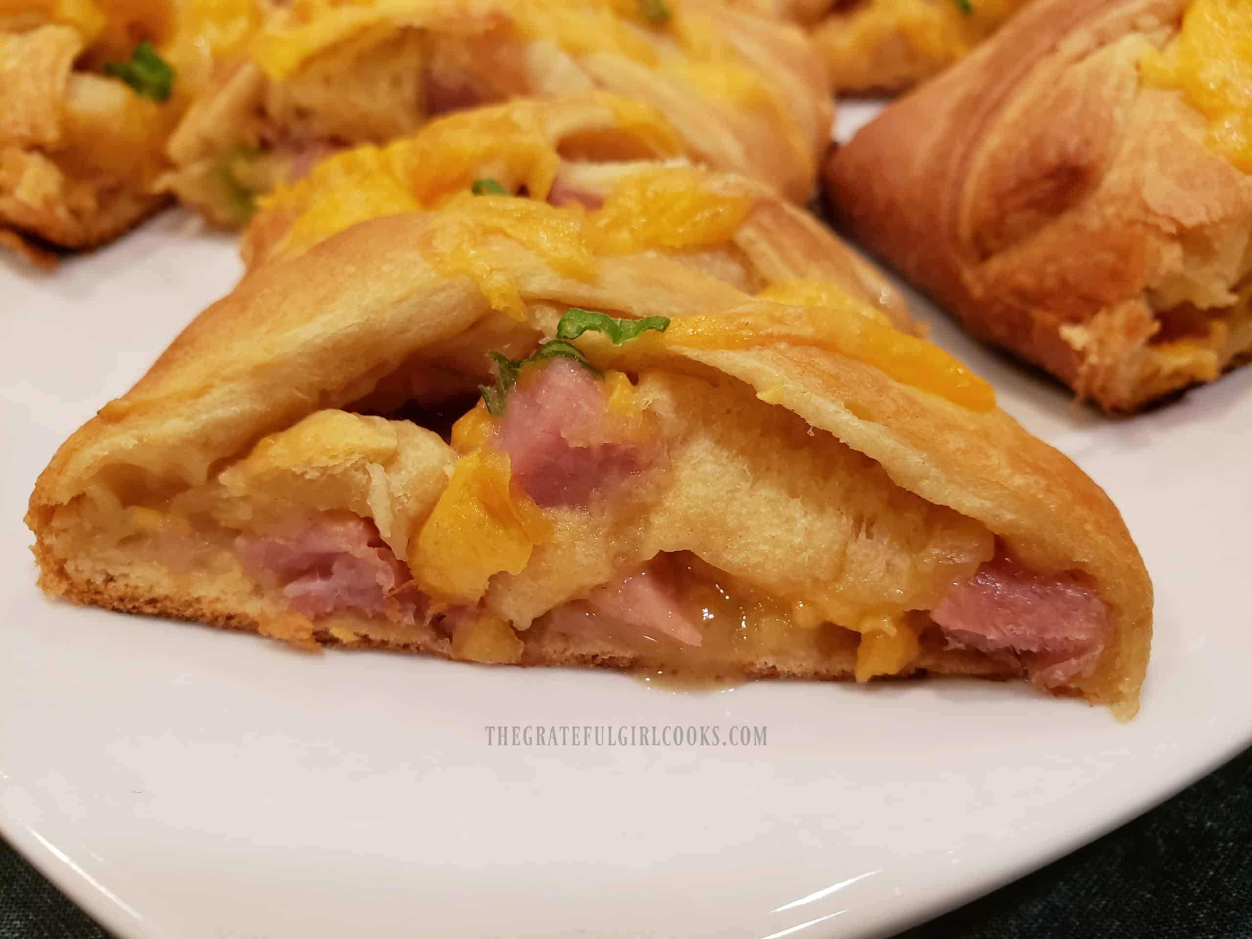 You can see meat and cheese inside one of the ham 'n cheese crescent bites..