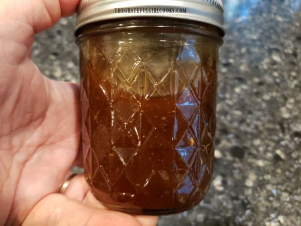 A pint jar is used to mix up the homemade balsamic vinaigrette.