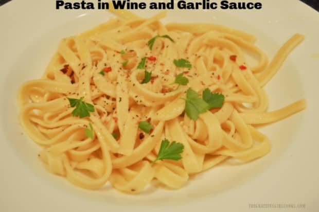 Make delicious pasta in wine and garlic sauce in under 15 minutes! SIMPLE to make, then garnish with Parmesan cheese for a tasty main dish!