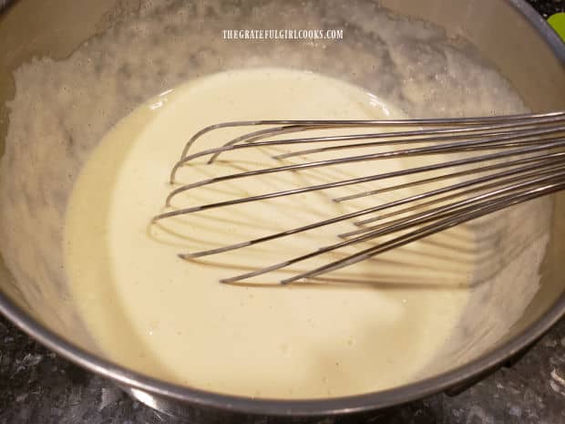 Eggs, whipping cream and spices are whisked for the Quiche Lorraine.