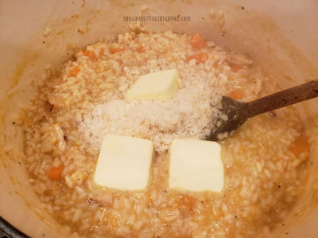 Butter and parmesan cheese are added to the butternut squash risotto