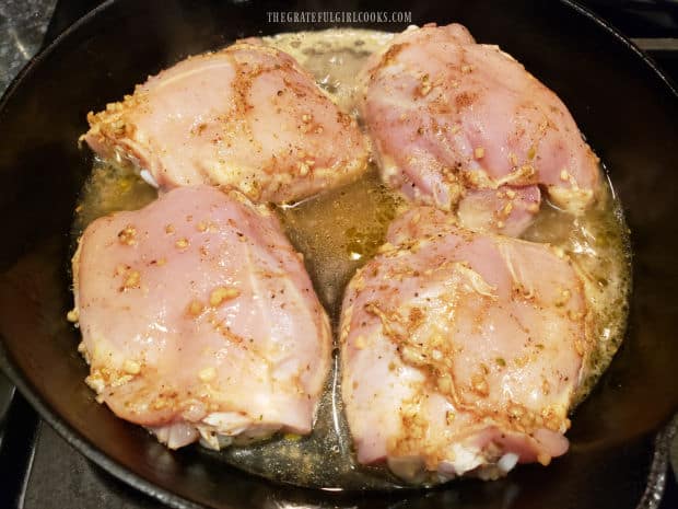 Chicken broth, lime juice and vinegar are brought to a boil in skillet with chicken.